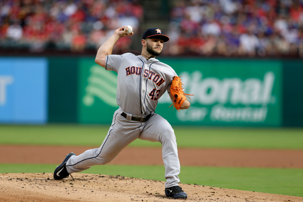 Houston Astros pitcher Lance McCullers Jr. (43) signs a fan's