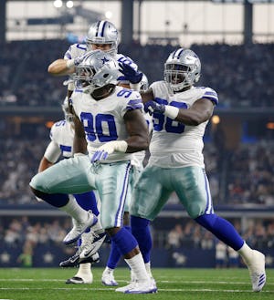 Dallas Cowboys defensive end Demarcus Lawrence (90) celebrates his sack of New York Giants quarterback Eli Manning near the goal line in the first quarter at AT&T Stadium in Arlington, Texas, Sunday, September 10, 2017. (Tom Fox/The Dallas Morning News)