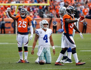 Dallas Cowboys quarterback Dak Prescott (4) reacts after a play in the first quarter at Sports Authority Field at Mile High Stadium in Denver, Colorado on Sunday, Sept. 17, 2017. (Rose Baca/The Dallas Morning News)