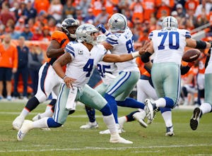Dallas Cowboys quarterback Dak Prescott (4) passes the ball against the Denver Broncos in the third quarter at Sports Authority Field at Mile High Stadium in Denver, Colorado on Sunday, Sept. 17, 2017. The Denver Broncos won 42-17. (Rose Baca/The Dallas Morning News)