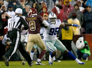 Dallas Cowboys defensive tackle David Irving (95) tackles Washington Redskins quarterback Kirk Cousins (8) during the second quarter at FedEx Field on Sunday, Oct. 29, 2017, in Landover, Md. (Jae S. Lee/The Dallas Morning News)