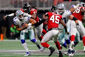 ATLANTA, GA - NOVEMBER 12: Dak Prescott #4 of the Dallas Cowboys is sacked by Adrian Clayborn #99 of the Atlanta Falcons during the first half at Mercedes-Benz Stadium on November 12, 2017 in Atlanta, Georgia. (Photo by Kevin C. Cox/Getty Images)