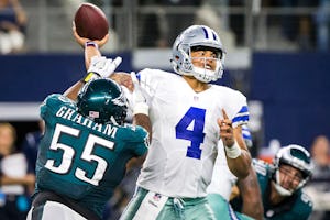 Dallas Cowboys quarterback Dak Prescott (4) is hit by Philadelphia Eagles defensive end Brandon Graham (55) as he attempts a pass during the final minute of regulation in an NFL football game at AT&T Stadium on Sunday, Oct. 30, 2016, in Arlington. (Smiley N. Pool/The Dallas Morning News)