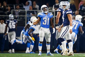 Dallas Cowboys quarterback Dak Prescott (4) walks off the field as Los Angeles Chargers free safety Adrian Phillips (31) has some words for him after Chargers defensive back Desmond King intercepted a Prescott pass and returned it 90 yards for a touchdown during the fourth quarter on Thursday, Nov. 23, 2017 at AT&T Stadium in Arlington, Texas. The Chargers won the game, 28-6. (Smiley N. Pool/Dallas Morning News/TNS)
NO MAGAZINE SALES MANDATORY CREDIT; NO SALES; INTERNET USE BY TNS CONTRIBUTORS ONLY