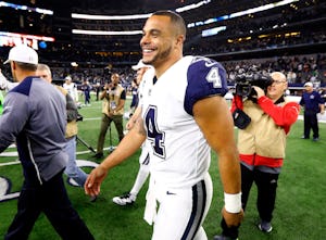 Dallas Cowboys quarterback Dak Prescott (4) flashes a big smile as he walks to shake hands with the Washington Redskins following their team's 38-14 win at AT&T Stadium in Arlington, Texas, Thursday, November 30, 2017. (Tom Fox/The Dallas Morning News)