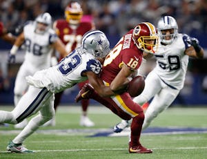 Dallas Cowboys cornerback Chidobe Awuzie keeps Washington Redskins wide receiver Josh Doctson (18) from catching a first quarter pass at AT&T Stadium in Arlington, Texas, Thursday, November 30, 2017. (Tom Fox/The Dallas Morning News)