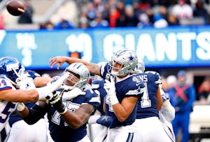 Dallas Cowboys quarterback Dak Prescott (4) throws a first half pass against the New York Giants at MetLife Stadium in East Rutherford, New Jersey, Sunday, December 10, 2017. (Tom Fox/The Dallas Morning News)