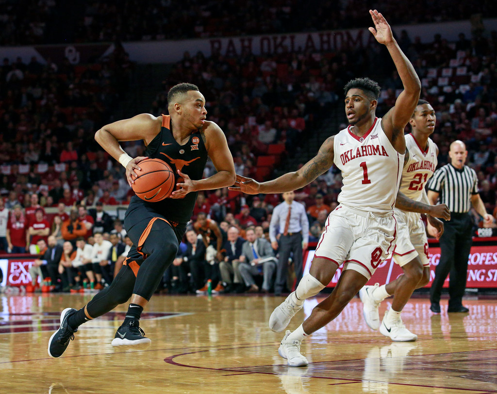 Texas suspends guard Eric Davis Jr. from playing following FBI's findings  into players receiving benefits