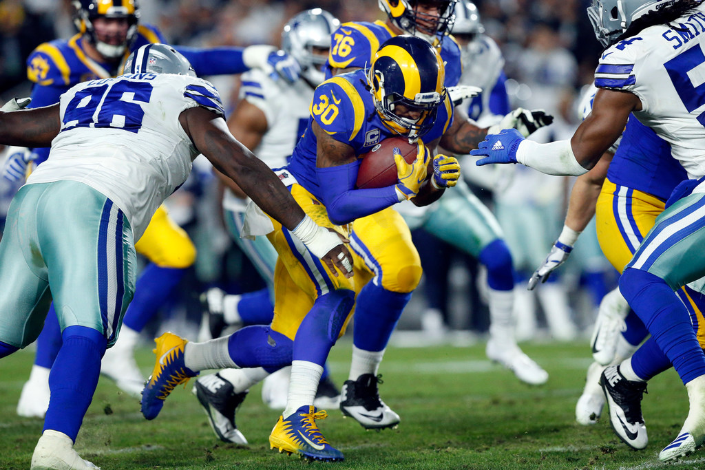 Did the LA Rams run all over Dallas because the Cowboys were unknowingly  tipping them off?